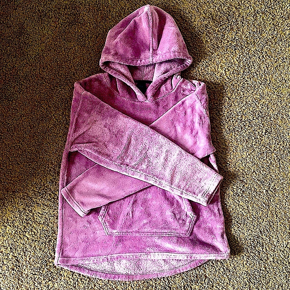This is a soft, smooth purple hoodie from champion that was $25 in a kids small.